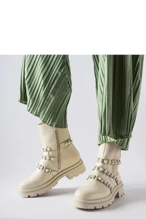 Beige ankle boots adorned with pearls