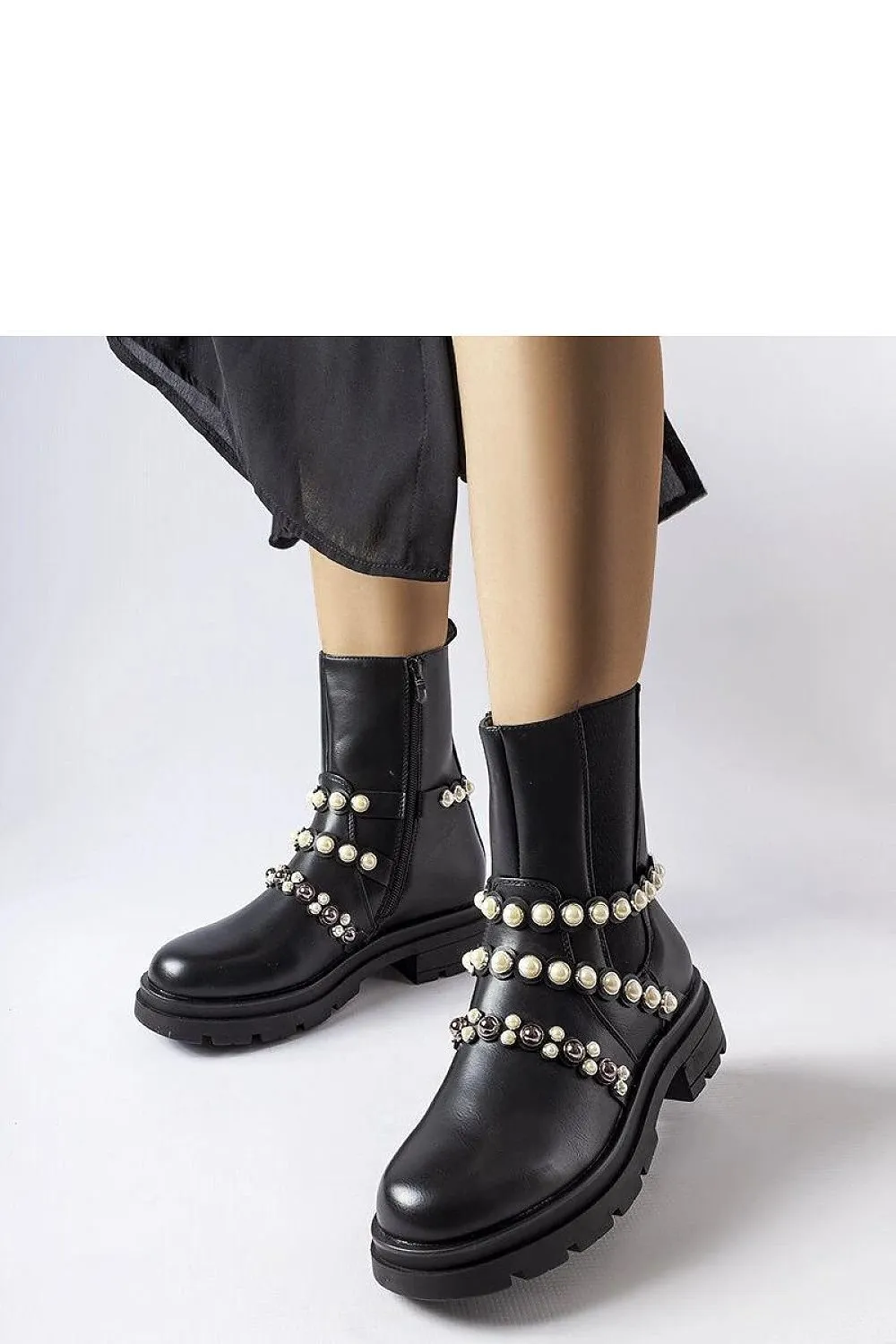 Beige ankle boots adorned with pearls