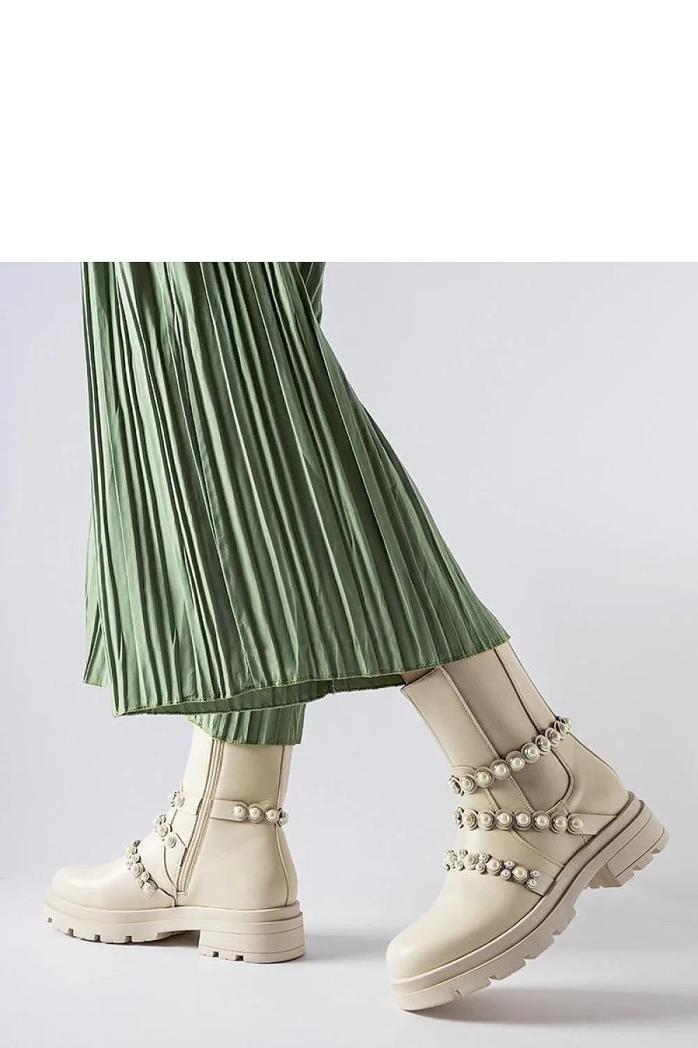 Beige ankle boots adorned with pearls