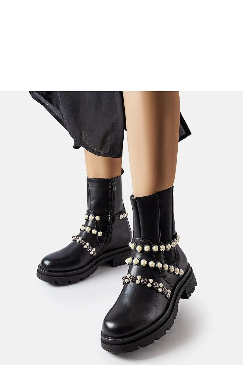 Beige ankle boots adorned with pearls