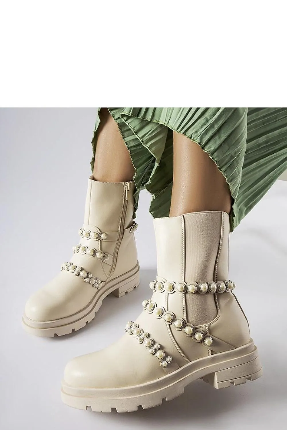 Beige ankle boots adorned with pearls