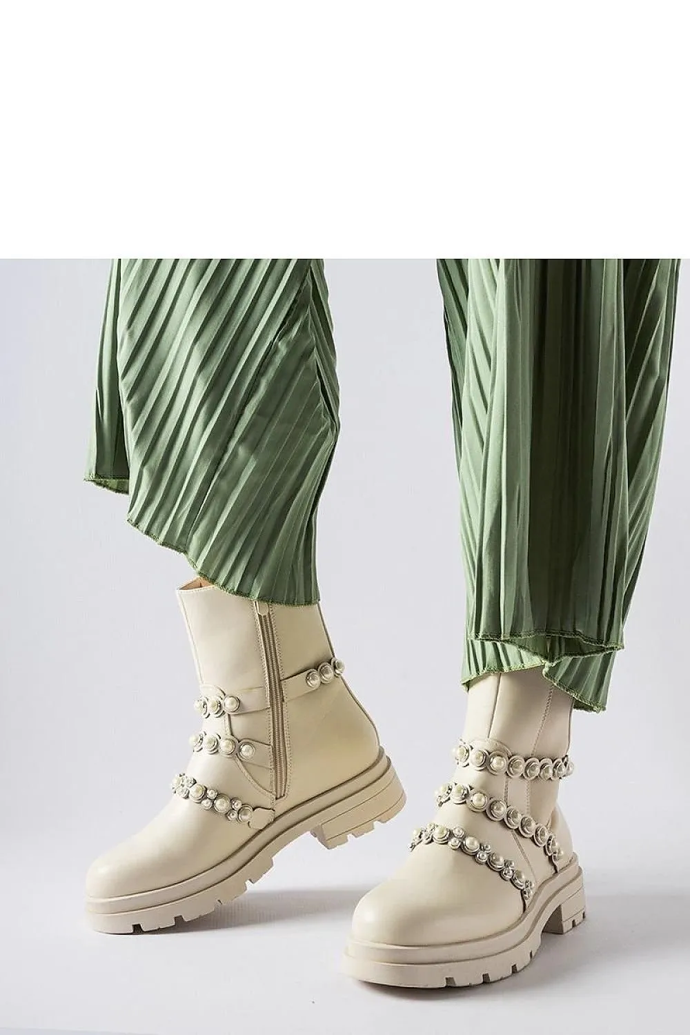 Beige ankle boots adorned with pearls